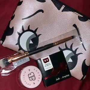 Black/sparkle eyeshadow, Butter lip balm, & brush